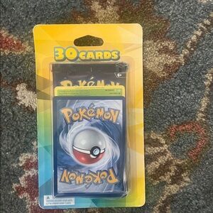 Pokémon pack of 30 cards plus 2 bonus items- brand new sealed